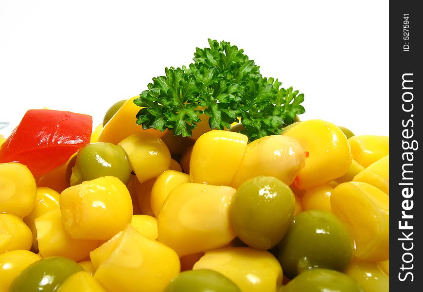 Detail fresh vegetable salad with peas, corn and paprika