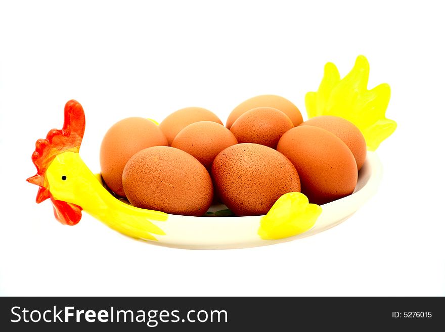 Eggs in bowl on white background