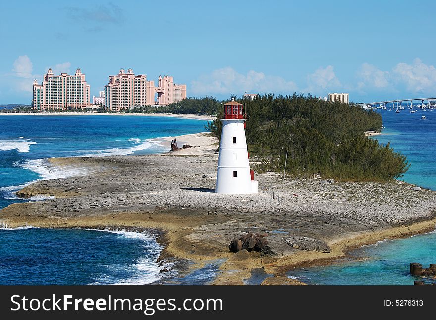 The view of Paradise Island cape with a lighthouse in front of it (The Bahamas).