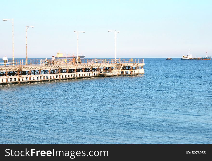 People on the pier in summer.