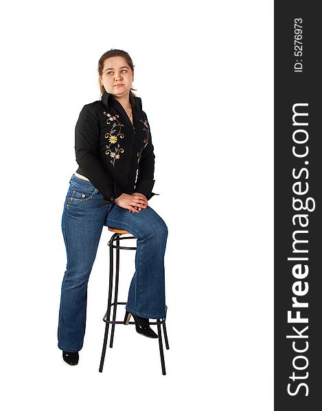 Girl sits on stool