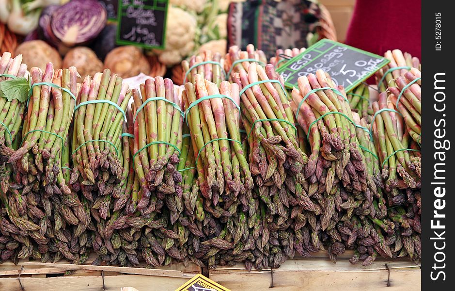 Fresh asparagus bundles at the market