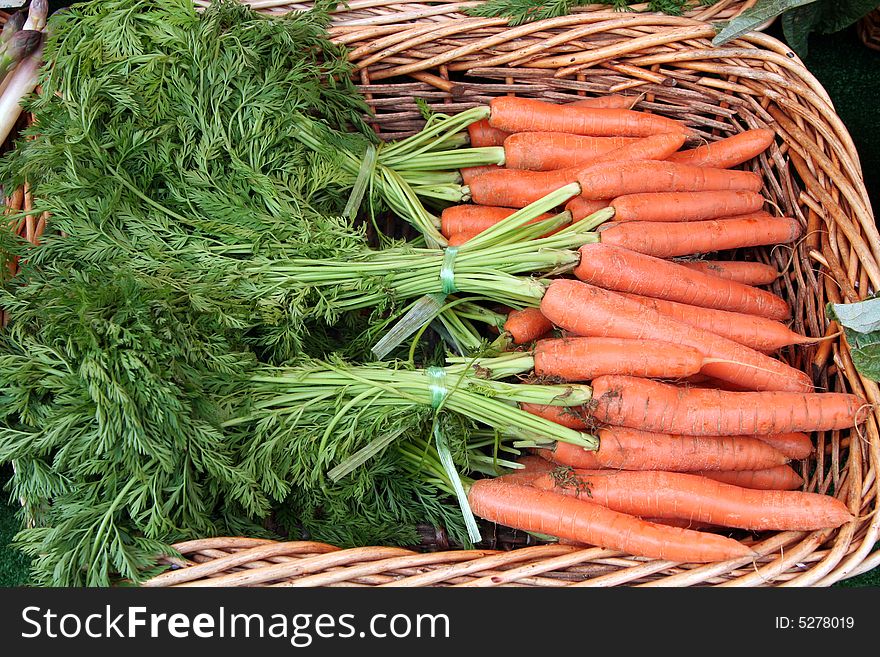 Bunch of whole carrots at the market