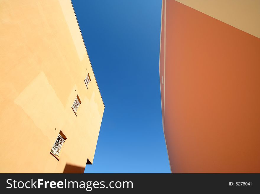 Wide angle shot of two mediterranean buildings. Wide angle shot of two mediterranean buildings