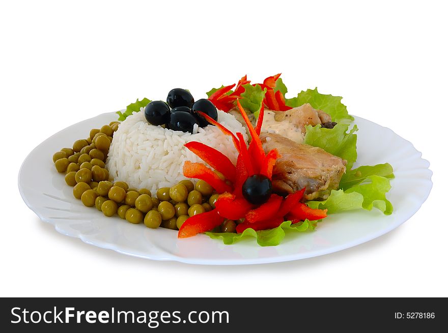 Rice and fried chicken with vegetable (lettuce, pepper,  olives and green peas) decoration. Rice and fried chicken with vegetable (lettuce, pepper,  olives and green peas) decoration.