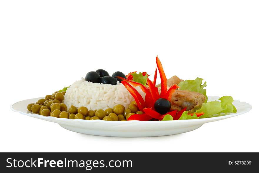 Rice and fried chicken with vegetable (lettuce, pepper,  olives and green peas) decoration. Rice and fried chicken with vegetable (lettuce, pepper,  olives and green peas) decoration.
