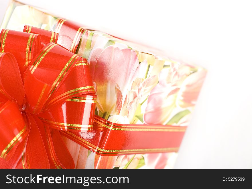 Gift box with red bow at white background. Gift box with red bow at white background
