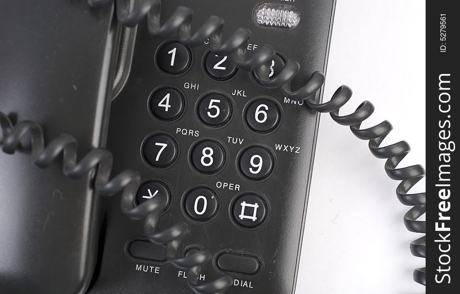 Black digital phone on white isolated background. Black digital phone on white isolated background