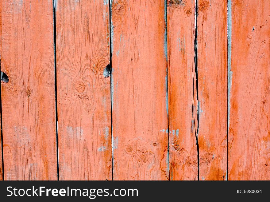 Painted planks fence as a background