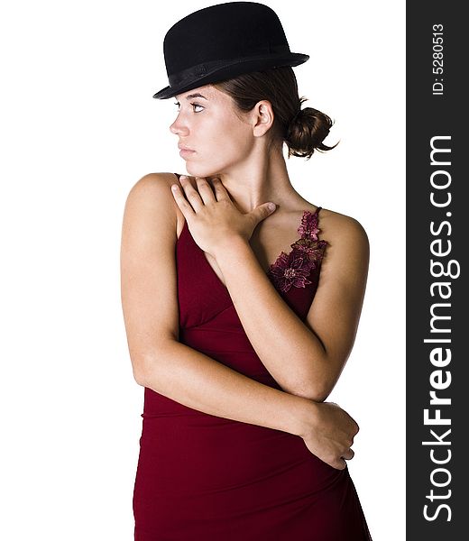 Beautiful young woman wearing an old fashion bowler hat and a red evening gown