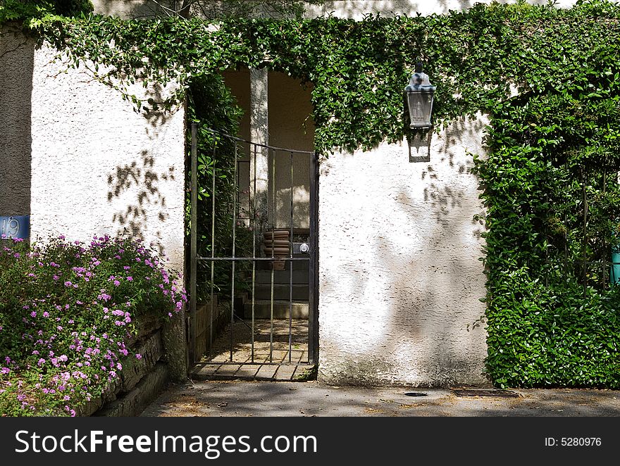 A garden entrance to a home. A garden entrance to a home.