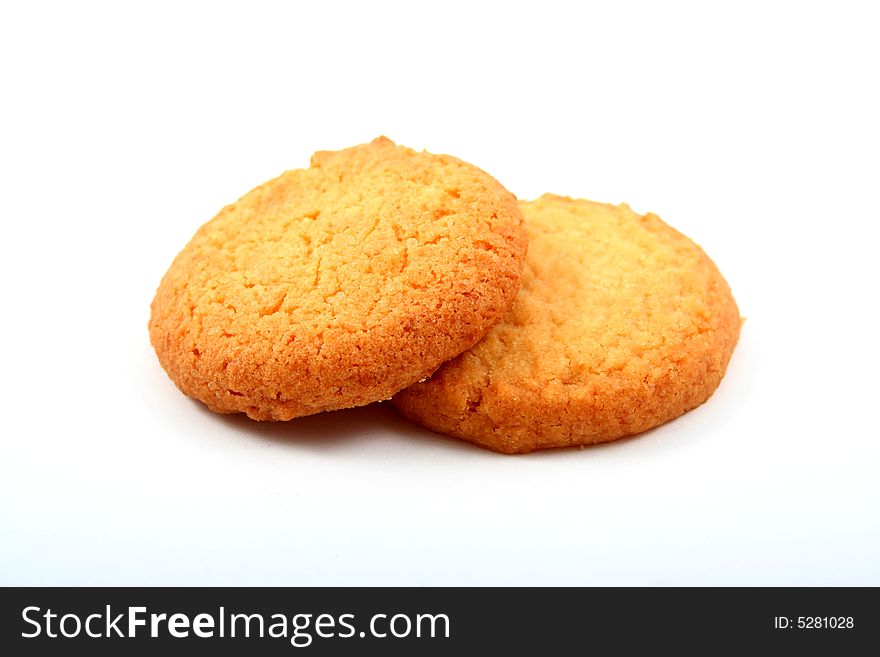 Two circle tasty cookies over white background. Two circle tasty cookies over white background