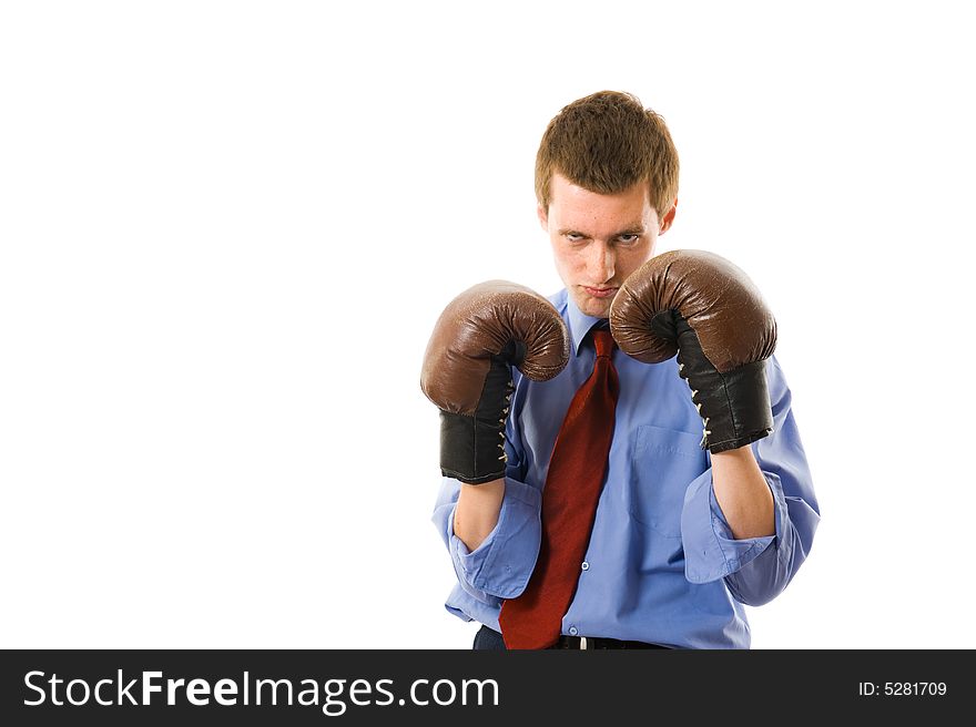 The young business man defends. Isolated over white background