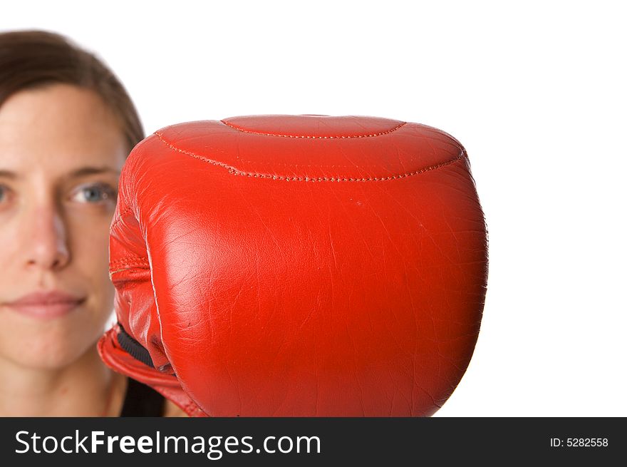 Woman in gym clothes, with boxing gloves, strength
