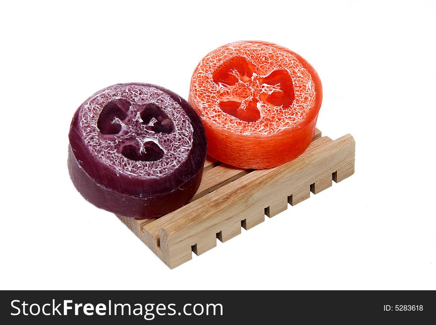 Fragrant soap on a wooden shelf