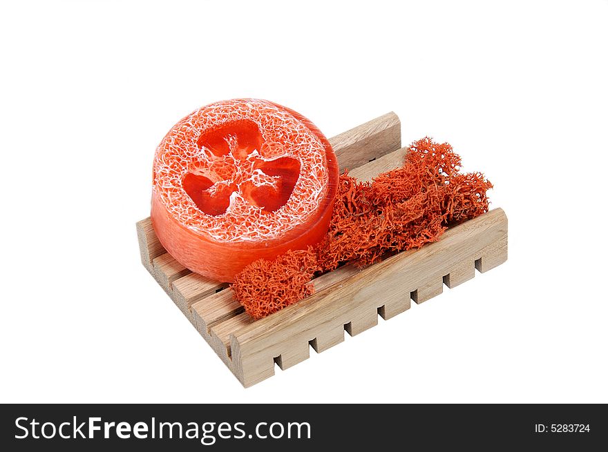 Fragrant soap on a wooden shelf