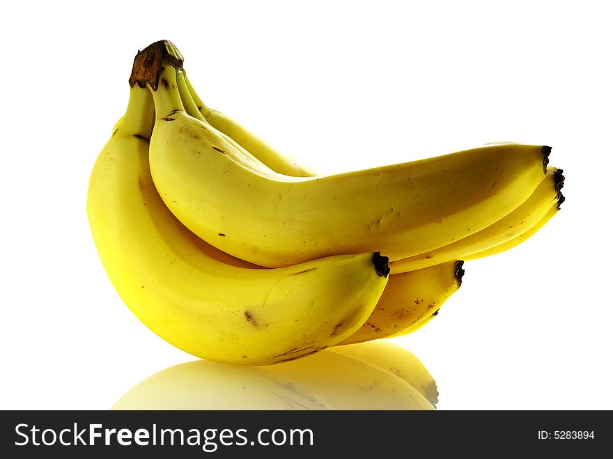 Bunch of ripe fresh bananas over white background