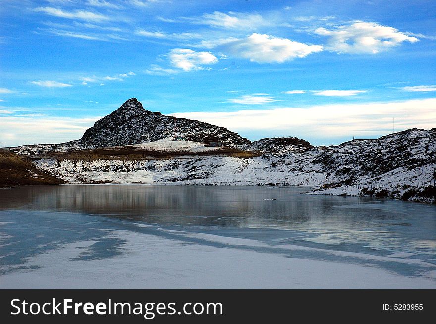 A view of a snow covered pond at the Arunachal prades. A view of a snow covered pond at the Arunachal prades.