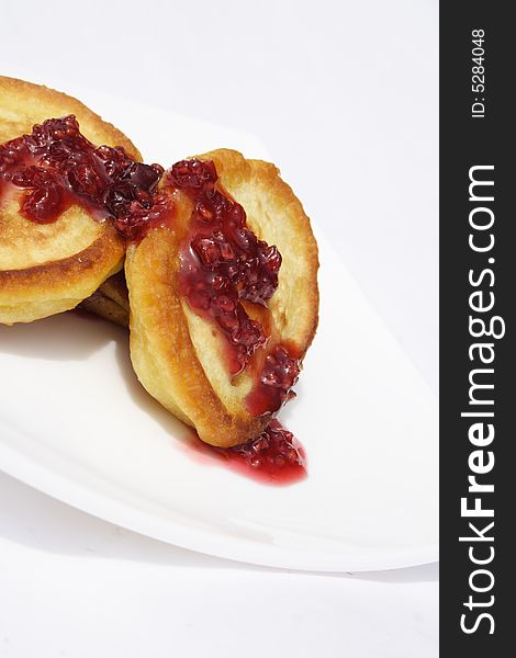 Pancakes with jam on plate