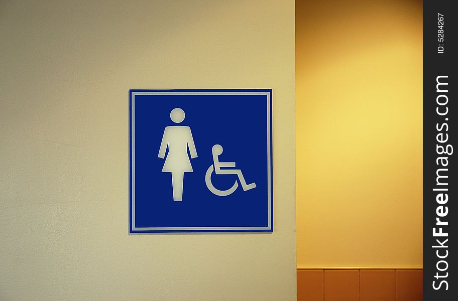 Sign to enterance of womans washroom