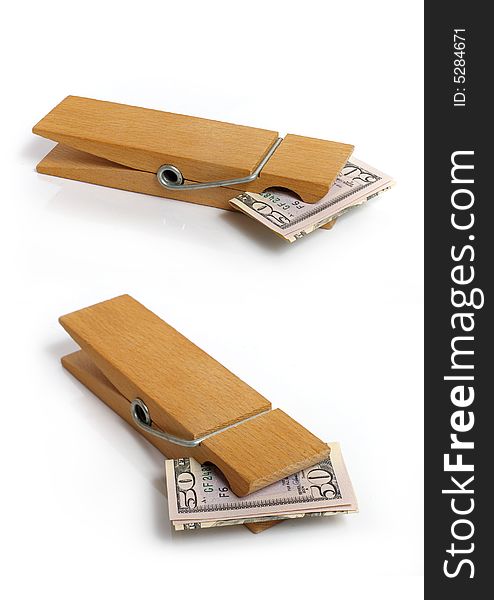 Wooden clothespin and fifty dollars. Wooden clothespin and fifty dollars