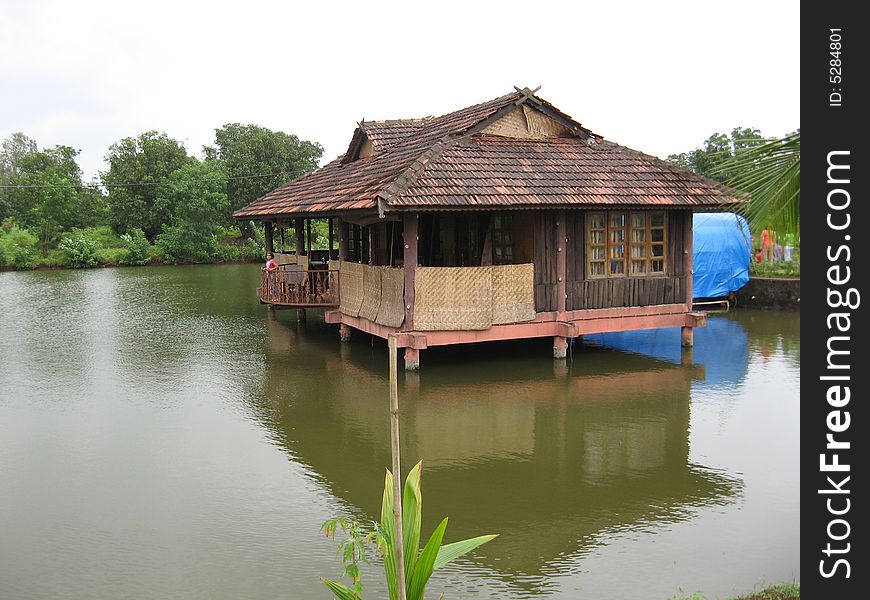 It is a lovely pond house anyone will love to stay in. Actually it is meant for Reosrt in Maharashtra , india.