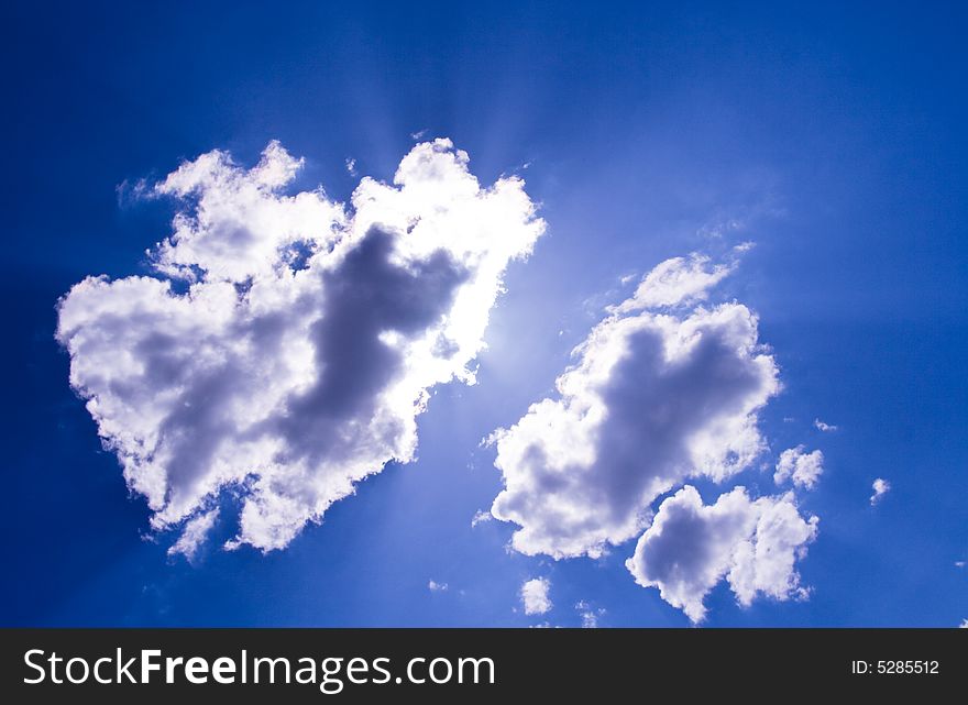 An early blue sky filled with clouds. An early blue sky filled with clouds