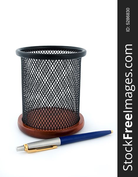 Office black basket with a pen. Office black basket with a pen