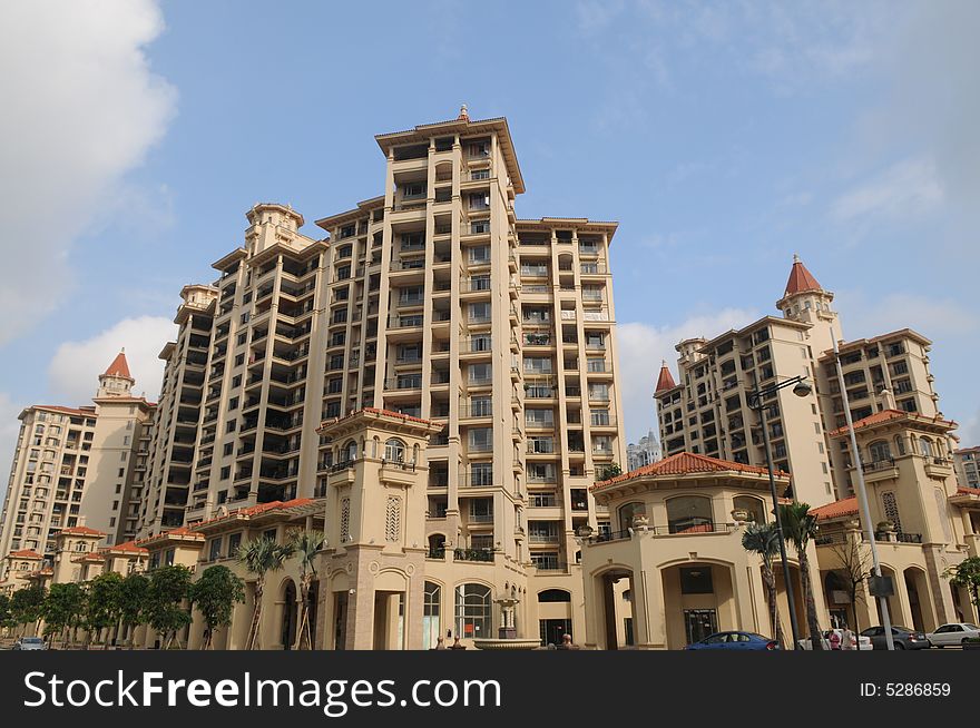 A luxury apartment blcok withe red spires under the blue sky,Foshan,Guangdong,China. A luxury apartment blcok withe red spires under the blue sky,Foshan,Guangdong,China.