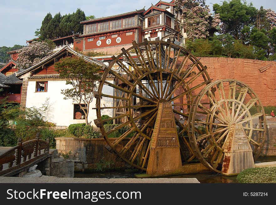 At the entrance of the old city of lijiang there is these tremendous and ancient Water tankers. At the entrance of the old city of lijiang there is these tremendous and ancient Water tankers.