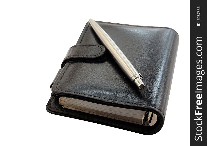 Black notebook with a pencil