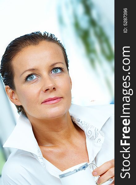 High key portrait of nice gorgeous woman drinking coffee. High key portrait of nice gorgeous woman drinking coffee