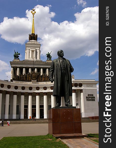 The sculpture of Vladimir Lenin in front of main building of exhibition center in Moscow. The sculpture of Vladimir Lenin in front of main building of exhibition center in Moscow