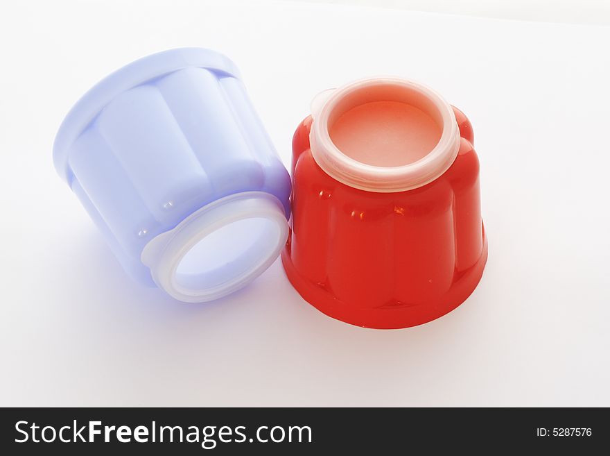 Blue and red jelly moulds for single servings of food
