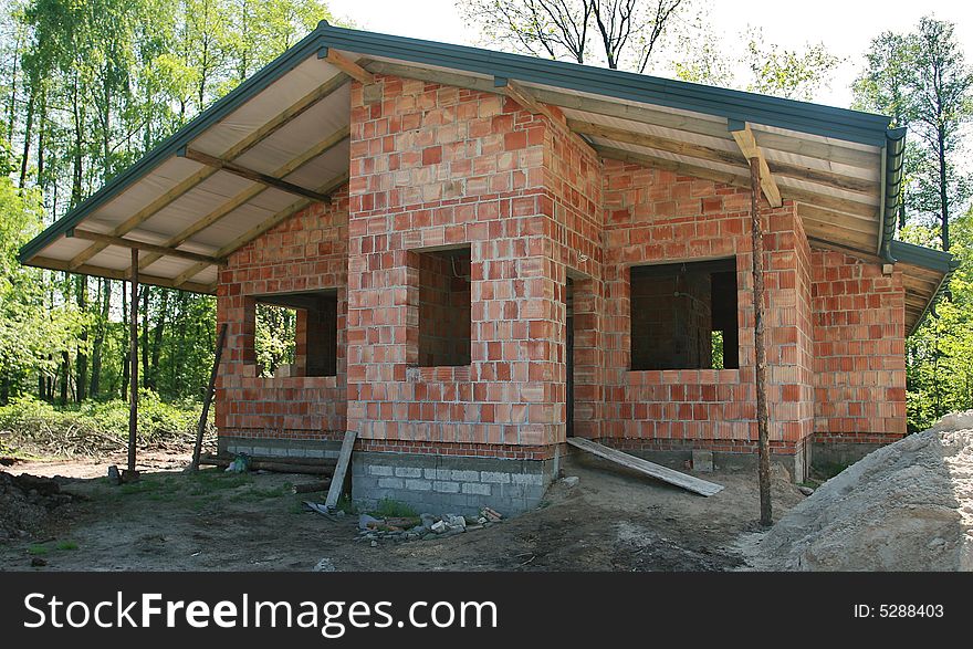 Construction of the single-family home. Construction of the single-family home