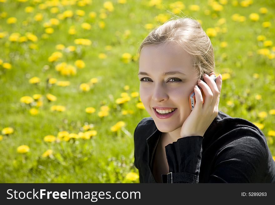 Young Woman Calling By Mobile Phone