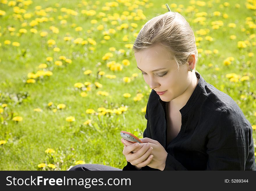 Message. Young Woman With Cell Phone.