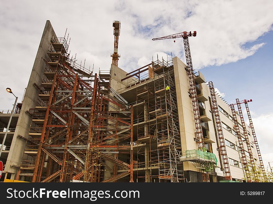 Large building site with cranes overhead working