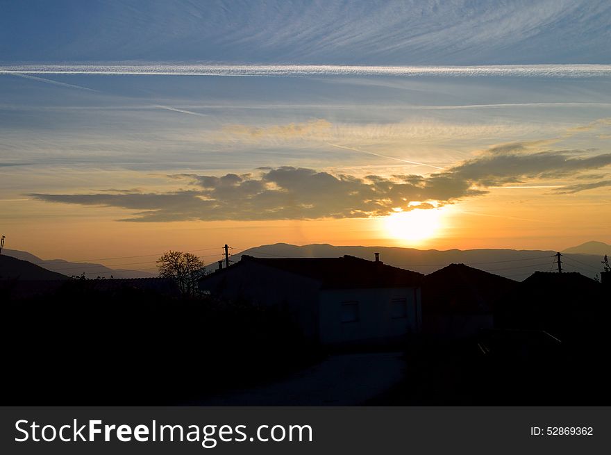 Capture of a blissful sunset with beautiful wing-like clouds. Capture of a blissful sunset with beautiful wing-like clouds