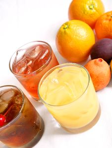 Three Mixed Drinks And Fresh Fruits Royalty Free Stock Photo