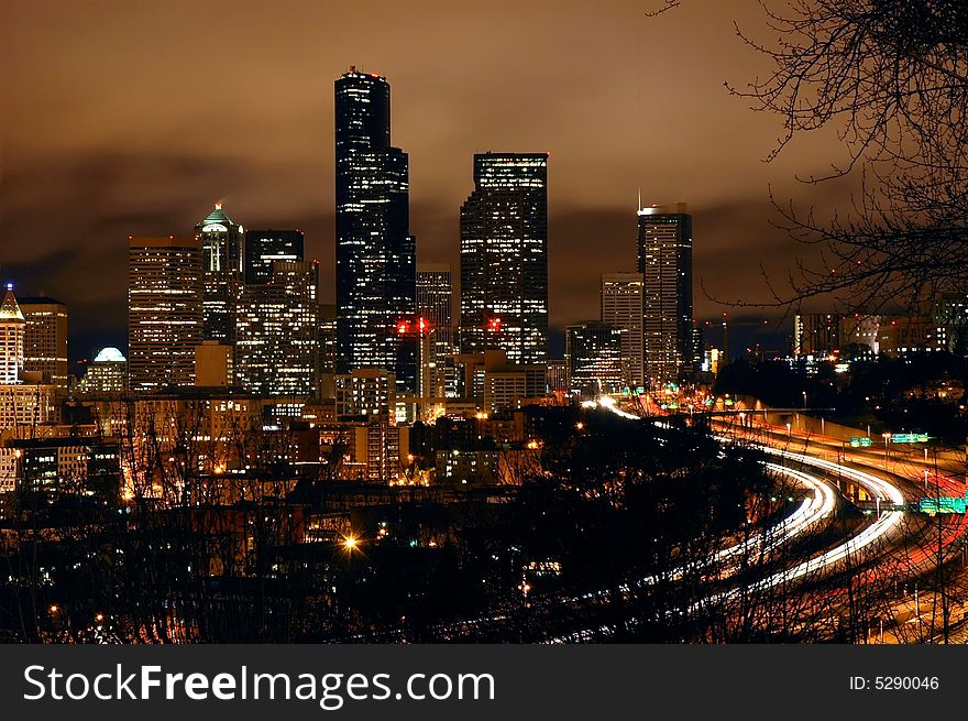 Downtown Seattle at night as viewed from a hill. Downtown Seattle at night as viewed from a hill.