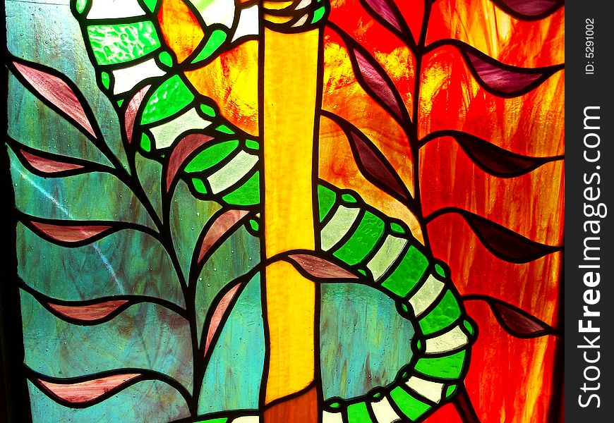 A stained glass art in church. A stained glass art in church.