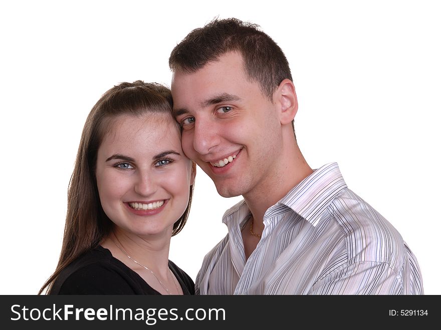 Attractive young couple enjoy an affectionate moment - on white. Attractive young couple enjoy an affectionate moment - on white