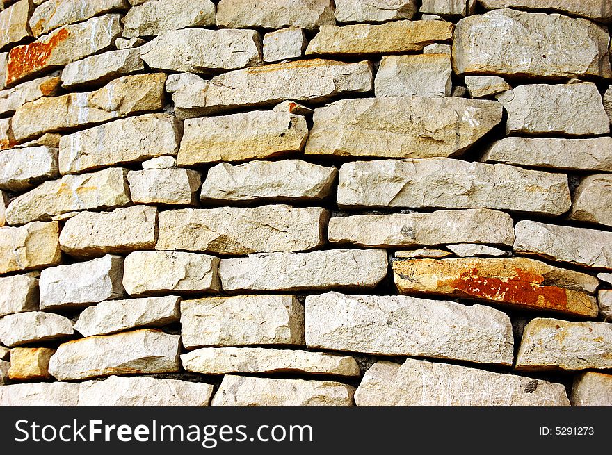 Old stone wall as background. Old stone wall as background