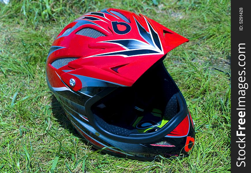 An image of the fullface bike helmet on the grass