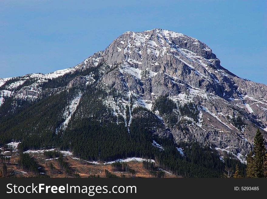 Snow peak of rocky mountain in kananaskis country, alberta, canada. Snow peak of rocky mountain in kananaskis country, alberta, canada