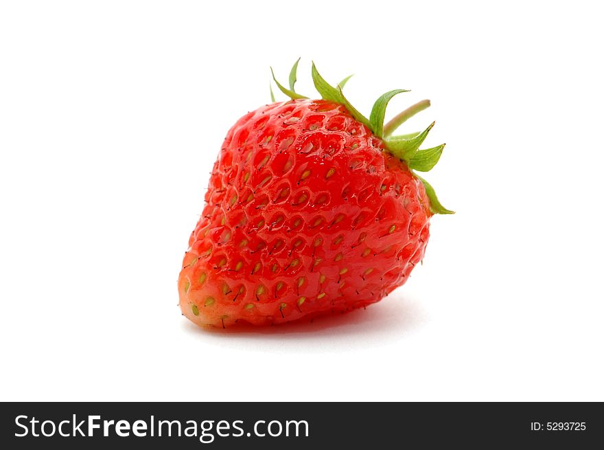 The juicy fresh just washed strawberry on a white background. The juicy fresh just washed strawberry on a white background