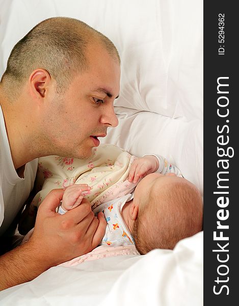 Dad and little baby girl over white background