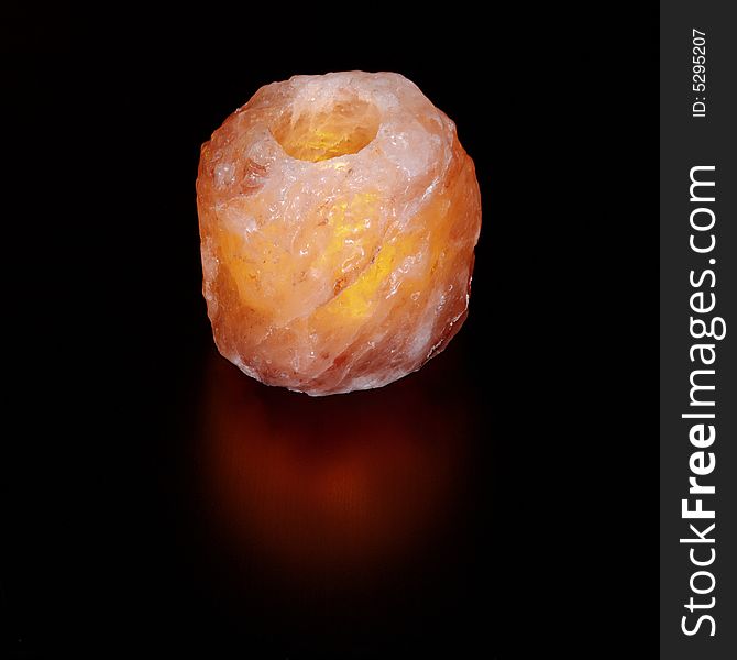 Warm light of the rock salt lamp. Warm light of the rock salt lamp