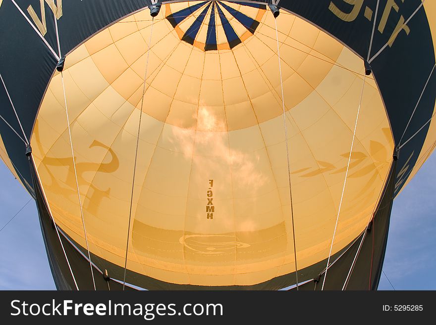 Inside a hot air balloon, we can see the flame for heat up air